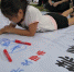 海南举行6.26国际禁毒日万人彩绘主题活动 - 中新网海南频道
