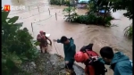 救援！热带低压致琼中持续暴雨，县城多地严重内涝，有居民家水深及腰 - 海南新闻中心