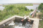 旧县村东，机站将清亮的昌化江水抽上高地灌溉。 何以端 摄 - 中新网海南频道