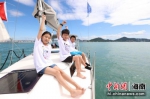 　青少年体验帆船运动。主办方供图 - 中新网海南频道