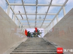 海南国际会展中心地下人行通道“整容” - 中新网海南频道