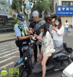 骑电动车未戴头盔，海口这些人被罚 - 海南新闻中心